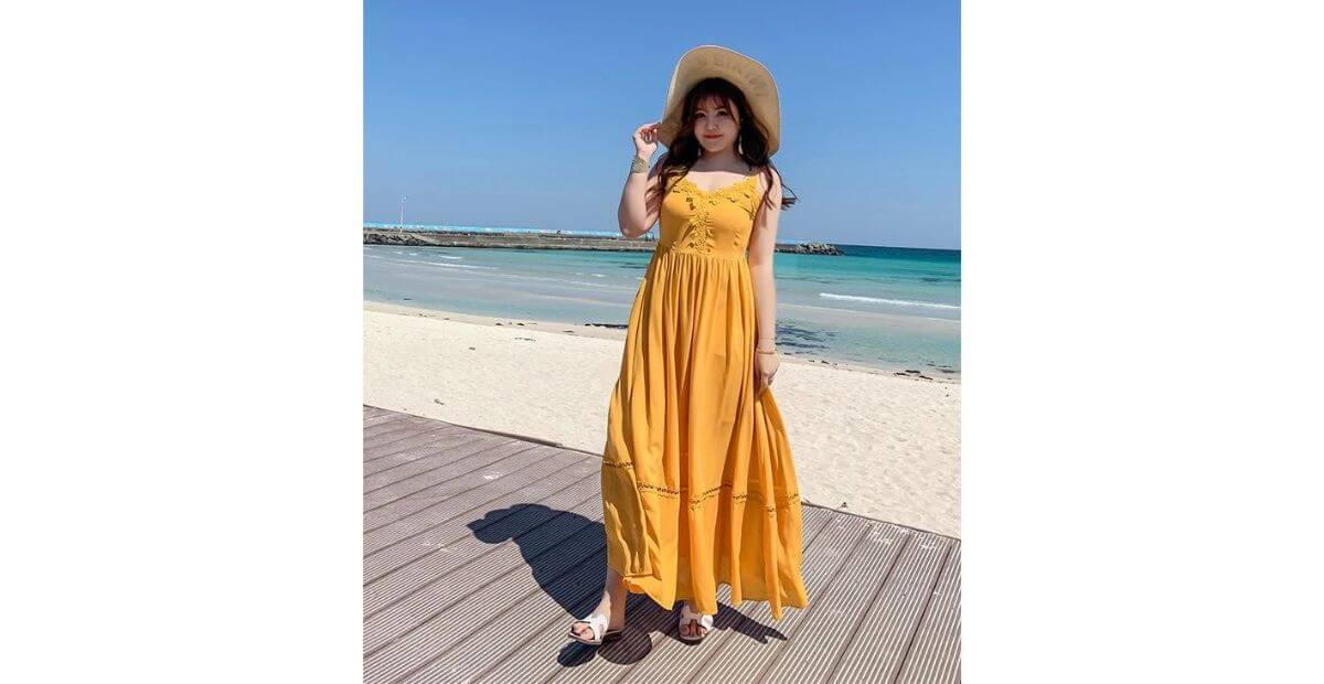 Đầm maxi nhấn eo cao kèm mũ rộng vành